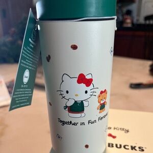 This is the Starbucks x Hello Kitty 2025 Holiday 12oz stainless steel tumbler